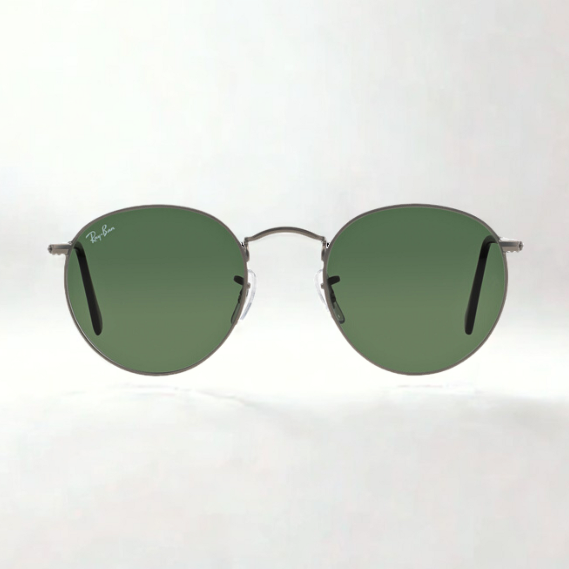 Ray-Ban Round Metal RB3447 con montura metálica redonda color plata y lentes verdes categoría 3 con filtro UV400 en Óptica Palmanova, Calvià