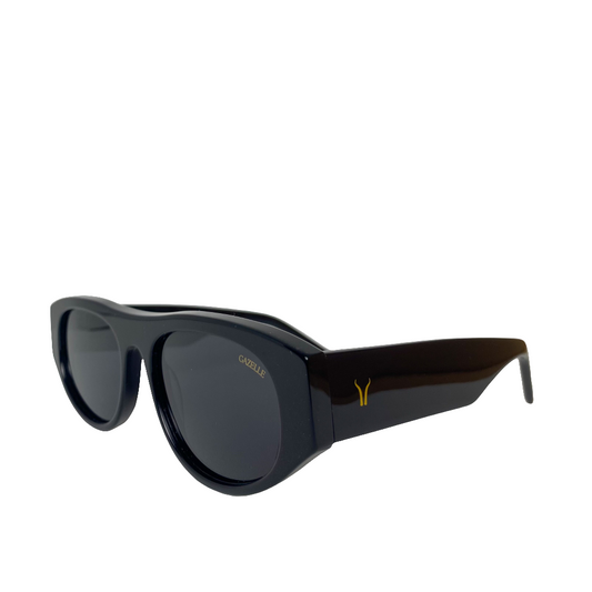 Vista lateral de gafas Gazelle Dorcas Bruno en acetato marrón oscuro con patillas anchas y estilo retro contemporáneo